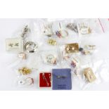 A quantity of silver earrings, silver gilt rings, etc.