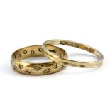 An 18ct patterned ring together with a 9ct gold stone set ring, (Q.5 & M).