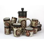A 1960's studio pottery coffee set, coffee pot H. 25cm.