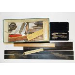 A quantity of early rulers, compass, drawing instruments, etc.