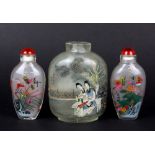 A pair of Chinese inside painted snuff bottles and a further 1960's inside painted snuff bottle,