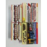 A Hornby 00 gauge Virgin Trains Pendolino' with Hornby Goods Master and two boxed sets of four