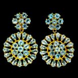 A pair of 925 silver gilt drop earrings set with pear and swiss cut blue topaz, L. 3.1cm, Dia. 2.