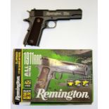 A boxed Remington 4.5mm air pistol.