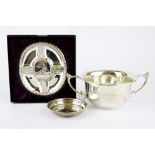 A hallmarked silver two handled cup, a silver ring dish and a boxed Bank of England 1694-1994