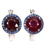 A pair of 925 silver earrings set with round cut rubies and tanzanites, Dia. 1.1cm.