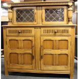 A Priory oak sideboard, L. 122cm, H. 126cm.