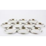 Ten sterling silver chocolate dishes.