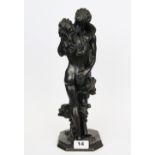 A cold cast figure of a couple embracing, H. 35cm.