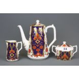 A Royal Crown Derby 'Rich Japan Pardoe' pattern three piece coffee set, tallest H. 17cm.