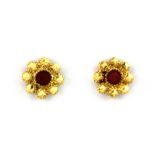 A pair of yellow metal (tested 22ct gold) stone set earrings, Dia. 0.8cm.