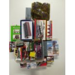 A large quantity of 00 gauge Hornby, Bachmann and Schleich boxed accessories; buildings, tunnels,