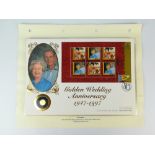 A sealed golden wedding anniversary 1947 to 1997 gold coin and first day cover.