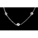 An 18ct white gold (stamped 750) 'Diamond by the Yard' style necklace set with approximately 3.1ct