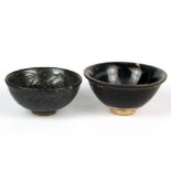 Two Chinese glazed pottery rice bowls, one with splash decoration the other with incised