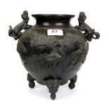A 19th Century Japanese bronze vase with elephant head feet, H. 22cm.