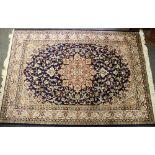 A blue ground finely woven Keshan type rug, size 200 x 140cm.