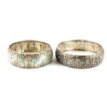 Two white metal enamelled bangles, Dia's 5.5cm 6.5cm.