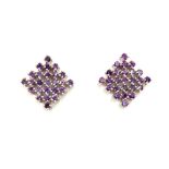 A pair of 925 silver earrings set with amethysts, 1.8 x 1.8cm.