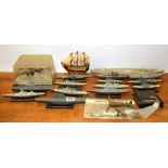 A quantity of miniature models of World War Two war ships and other related models.