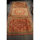 A pair of wool rugs together with a further wool rug, size 160 x 120cm.