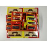 Approximately 55 items of boxed Hornby 00 gauge rolling stock .