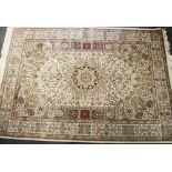 A white ground finely woven Keshan type rug, size 200 x 140cm.