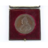A cased Queen Victoria bronze medal, Dia. 7.5cm.