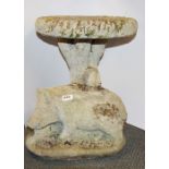 A concrete garden bird bath with a boar on the pedestal, H. 53cm Dia. 40cm.