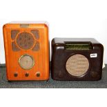 A Bakelite radio and wooden radio.