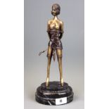 An Art Deco style bronze figure of miss Whiplash.