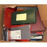 A large box of First Day Covers and other stamps.