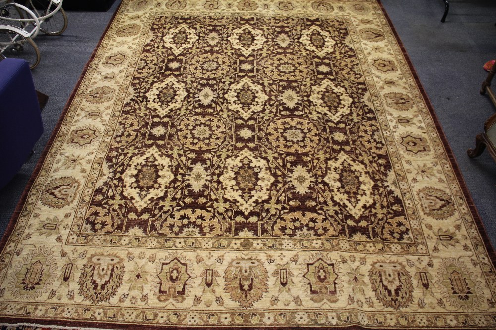 An Afghan Fereghan hand knotted wool rug, size 311 x 245cm.