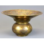 Islamic interest. A silver and copper decorated hammered brass Eastern spittoon, Dia. 19cm H. 11cm.