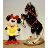 A large Melba ware ceramic circus horse and a Minnie Mouse figure.