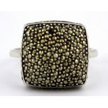 A 925 silver marcasite set ring, (O.5).