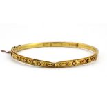 A boxed 15ct yellow gold bangle, Dia. 55cm, (a/f), W. 5.1g.