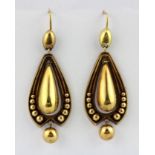A pair of yellow metal (tested minimum 9ct gold) drop earrings, L. 4.5cm.