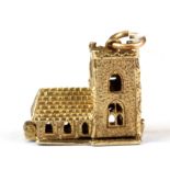 An unusual 9ct gold hinged church stanhope charm/pendant, 2.2 x 2.5cm.
