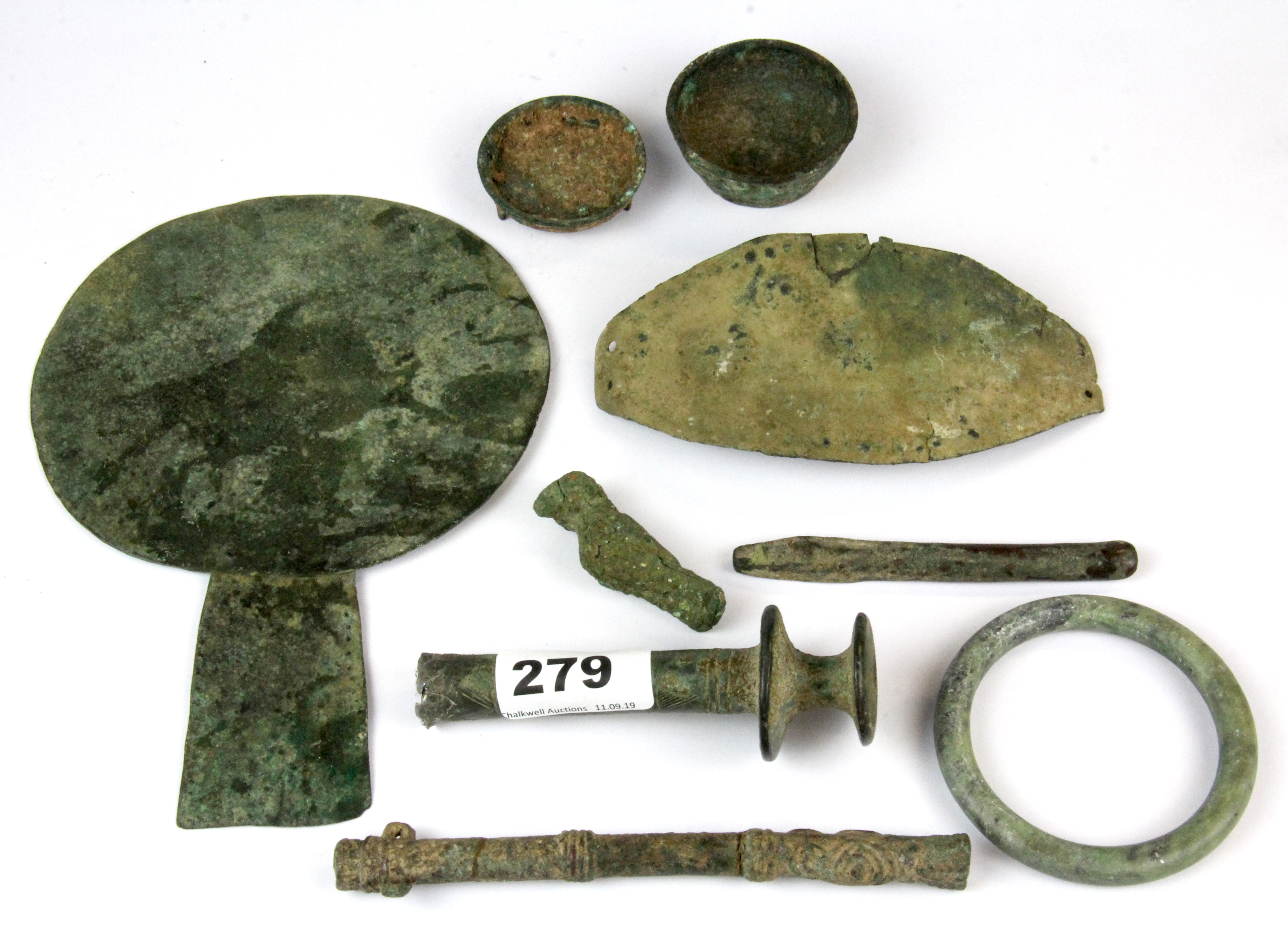 Antiquities Interest. A group of mixed early bronze and hammered copper items including a hand