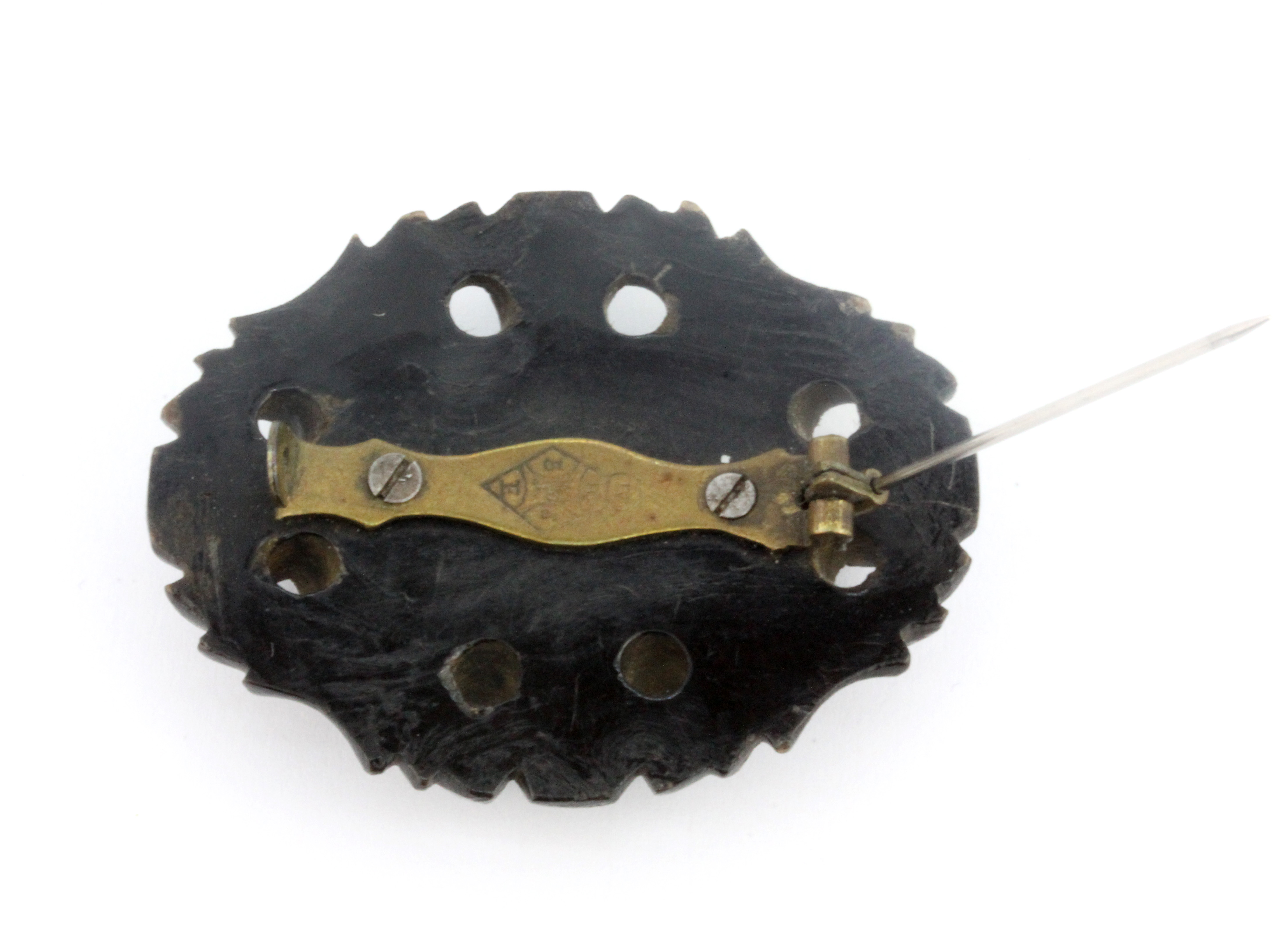 A carved jet brooch together with a pair of jet earrings, L. 5cm. - Image 2 of 2