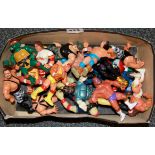 A box of articulated wrestler figures.