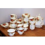 A Royal Albert 'Old Country Roses' extensive tea set and coffee cups, first quality.