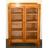 A 1930's bookcase, size 75 x 107cm.