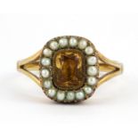 A boxed 9ct yellow gold citrine and seed pearl set cluster ring, (Q).