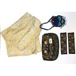 A 1920's metal decorated shawl and beadwork purse, two panels decorated with cut steel and a further