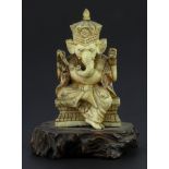 A 19th Century Chinese carved ivory figure of the elephant god Ganesh, H. 10cm.