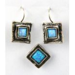 A 925 silver synthetic opal set pendant and similar pair of earrings.