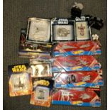 A group of boxed Star Wars collector's vehicles and spaceships.