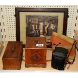 A wooden cigarette box, tea box, camera and framed print.